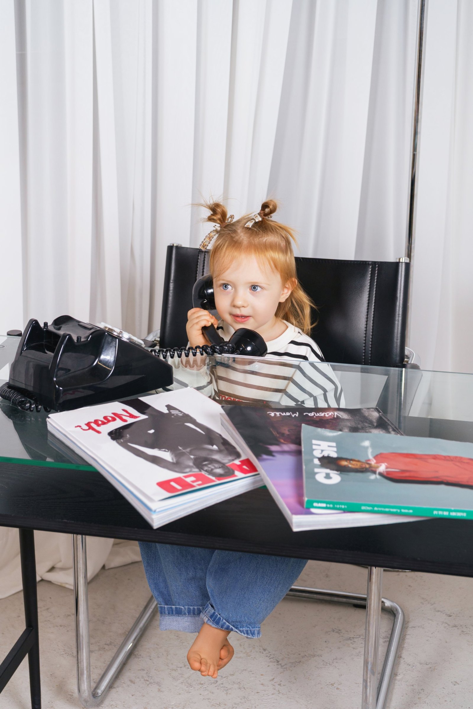 Child wearing SOLO RAISED oversized essentials